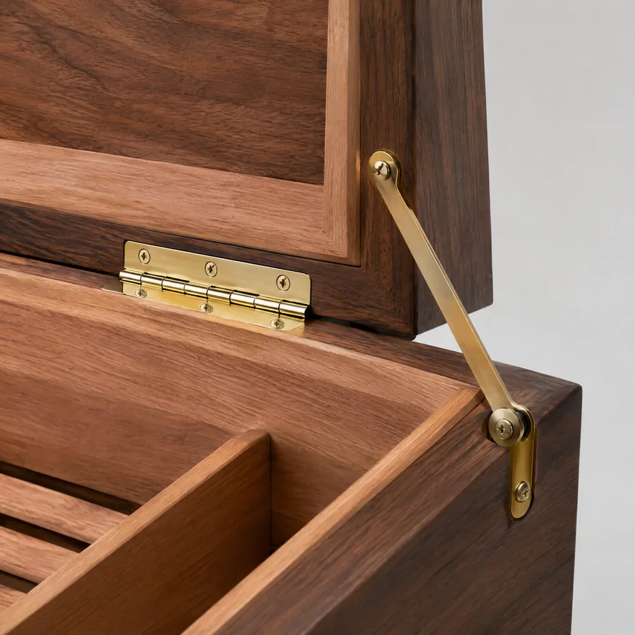 Unbranded cigar humidor with visible brass hinge and lid stay