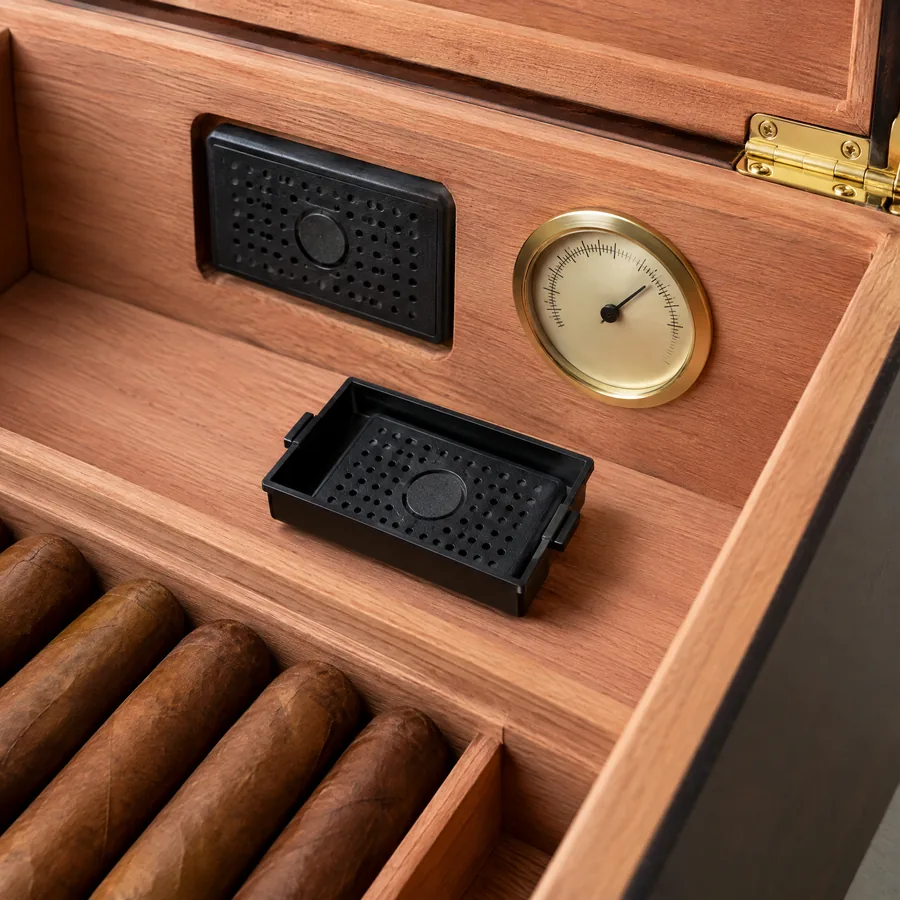 Unbranded humidity component placement in a cedar-lined cigar humidor