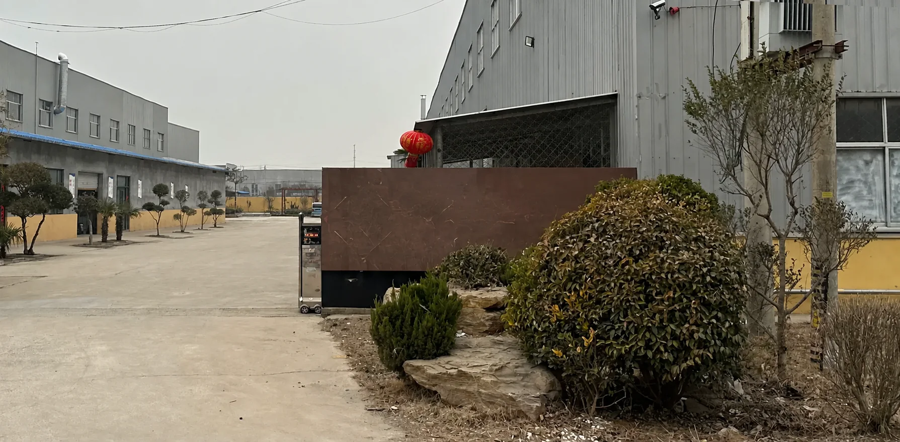 Unbranded factory entrance and workshop buildings