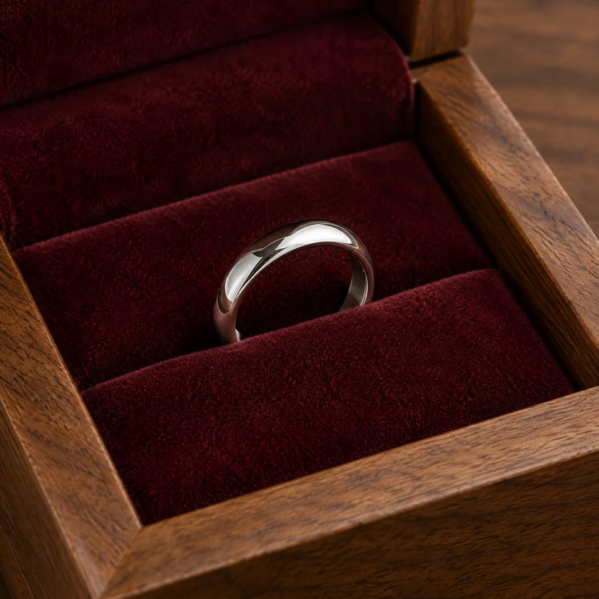 Deep velvet ring slot inside a custom wood jewelry box
