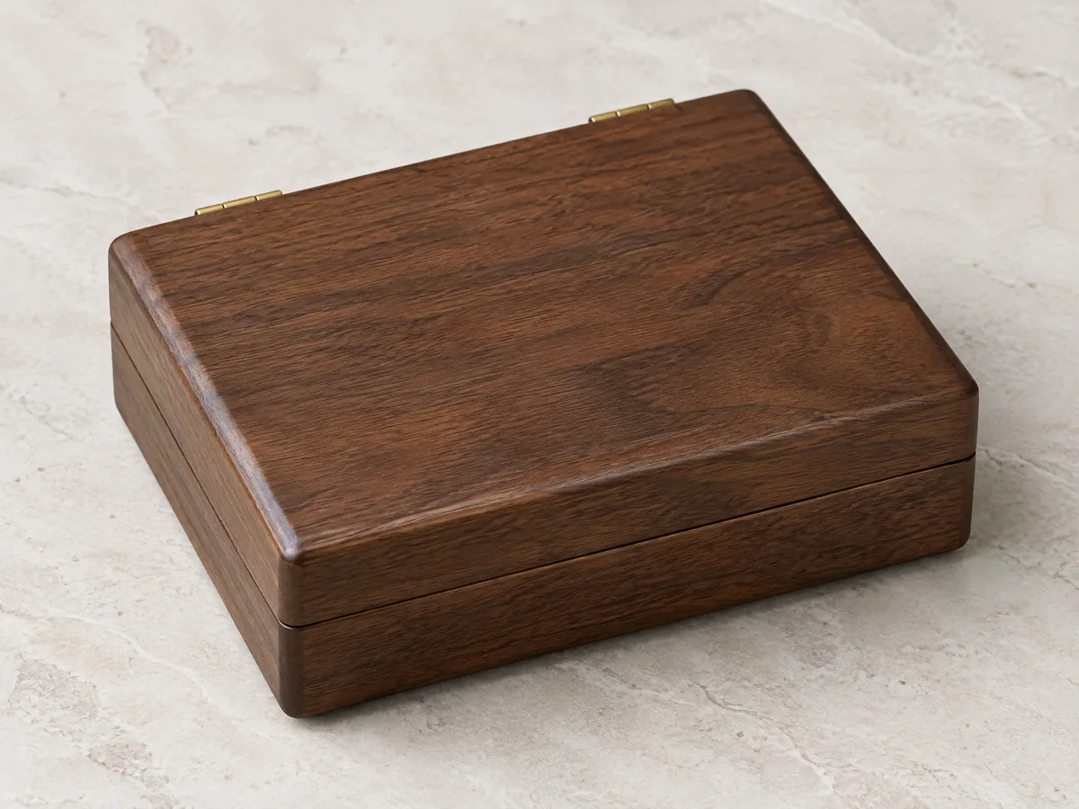 Closed solid walnut coin case lid without a viewing panel