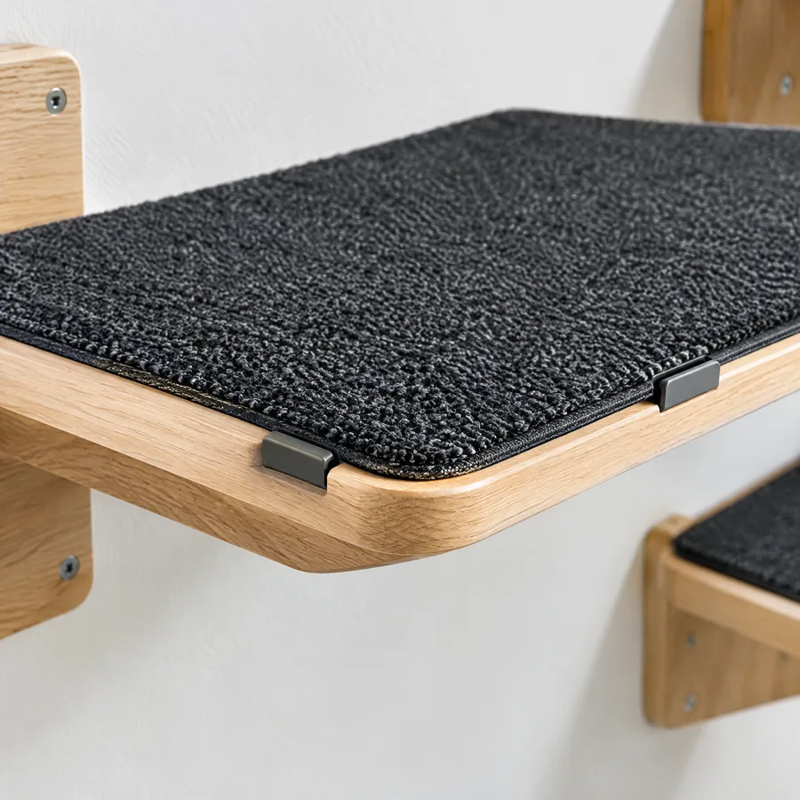 Unbranded removable low-pile carpet traction pad on a wood cat shelf