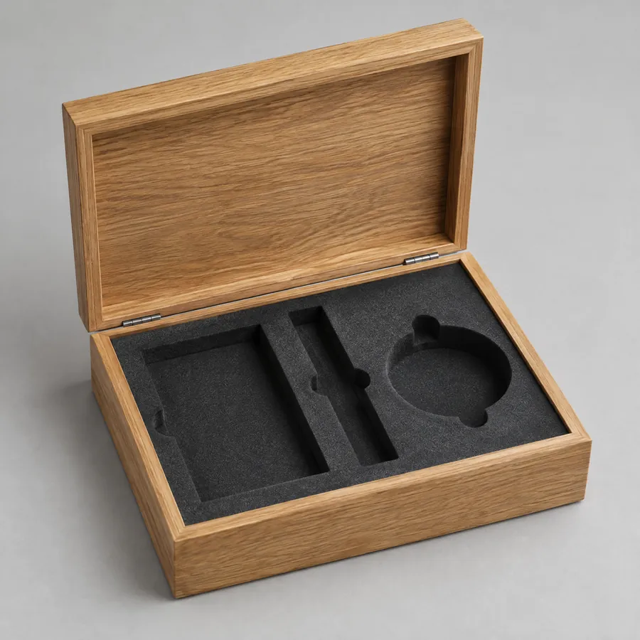 Custom cut EVA foam insert inside an unbranded wooden box