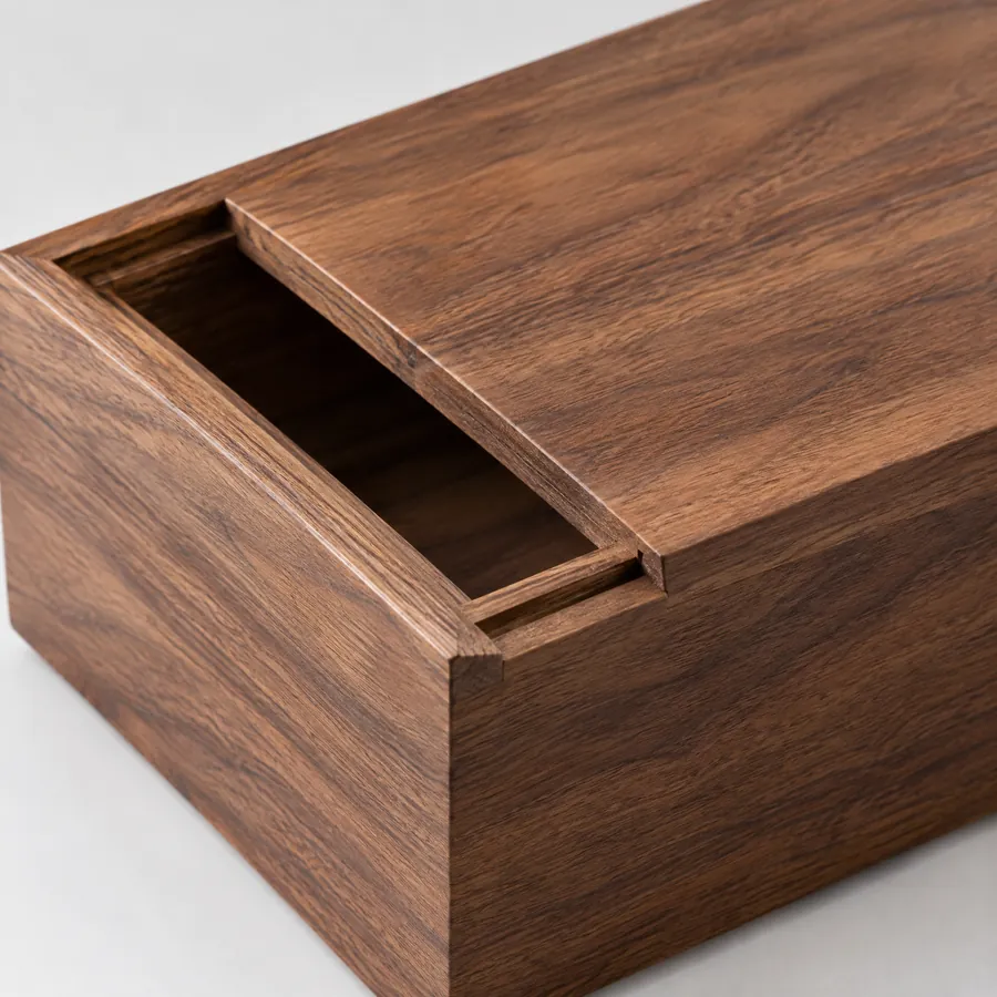 Sliding lid on an unbranded wooden box