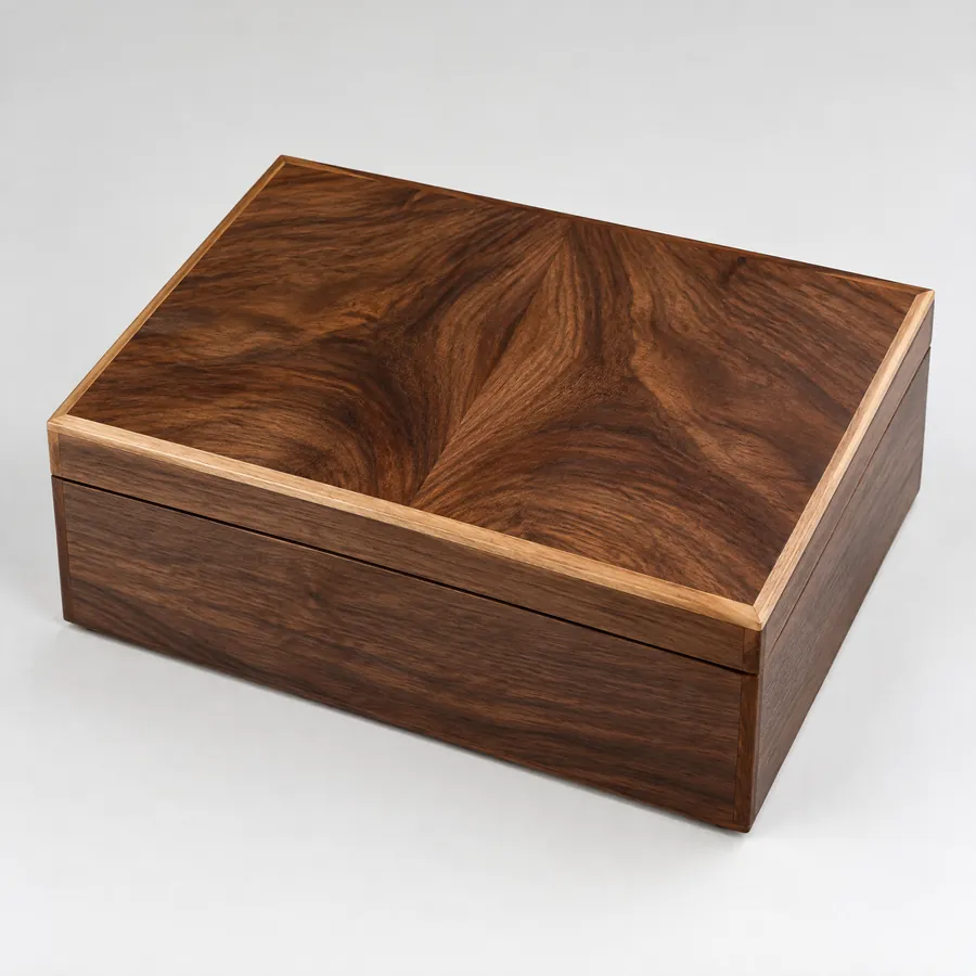 Unbranded dark wood box showing a refined finished surface